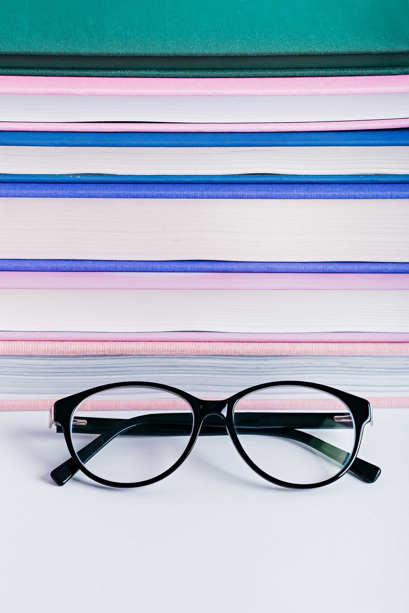 close-up-of-reading-eyeglasses-on-books-background-2021-05-02-21-58-05-utc.jpg